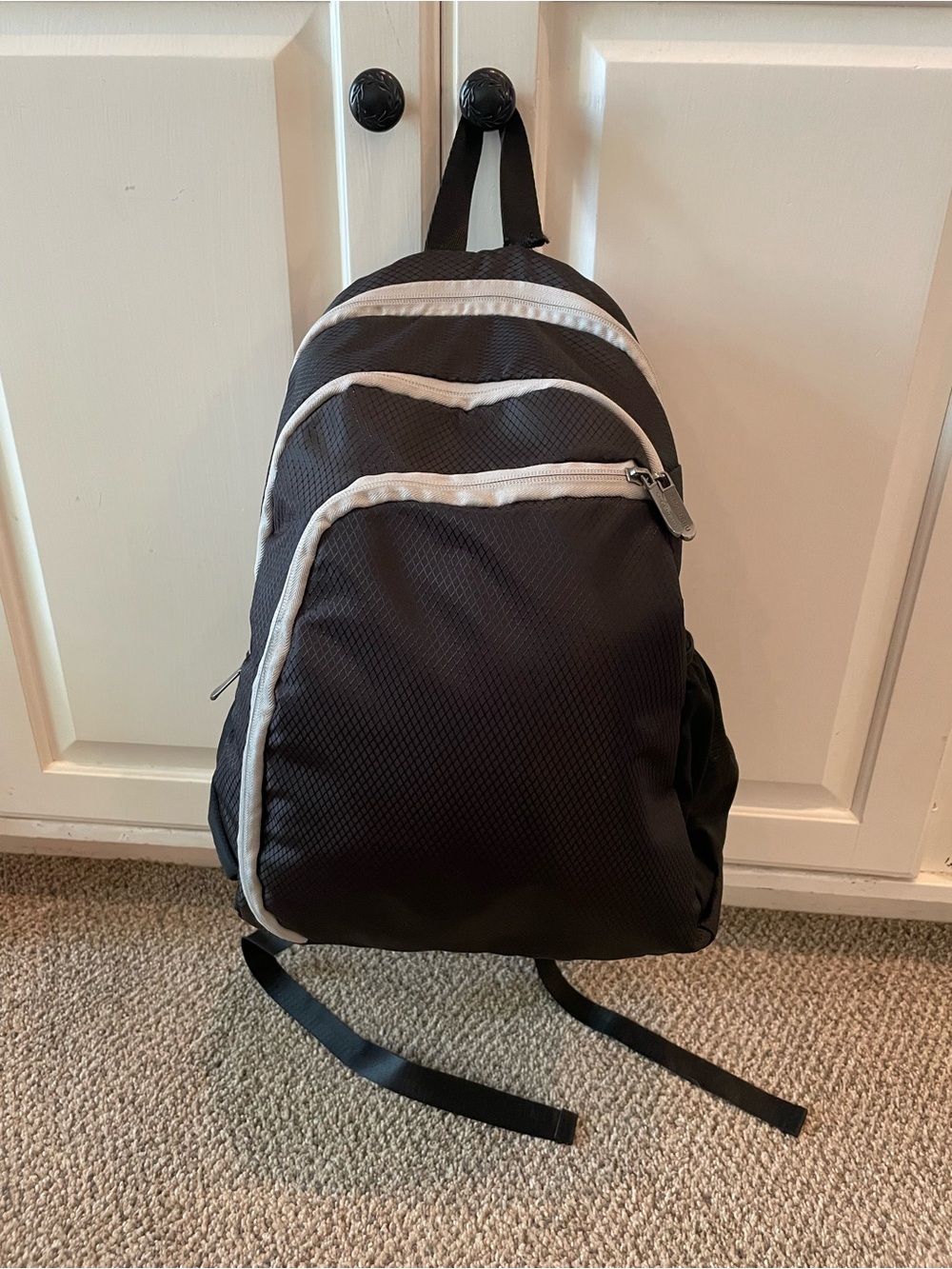 Spoengru Black Backpack with Gray Trim and Multiple compartments